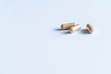 Pills on white background