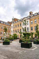 View of Heron Square, a quiet riverside development redesigned in the 1980s, blending historic facades with classic architecture, in Richmond upon Thames, south of London, England, Uk