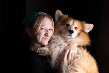 girl and dog corgi