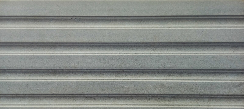 Gray metallic roll up door shutter, horizontal lines, industrial design