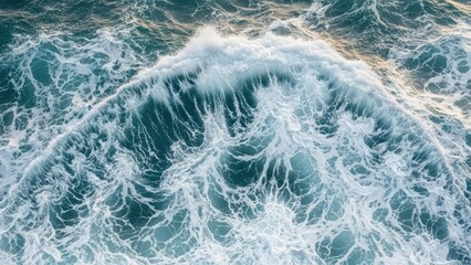 Dynamic Ocean Waves Crashing and Foaming in a Vibrant Blue Sea.