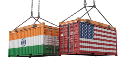 Two shipping containers painted with Indian and American flags being lifted by cranes, symbolizing trade relations, import-export agreements, and economic cooperation between India and the United Stat