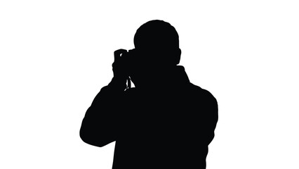 Man silhouette taking picture with camera