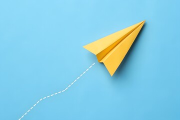 Paper airplane flying in the sky