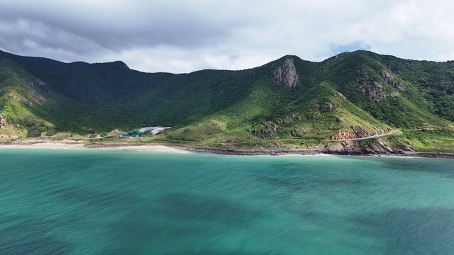 Tropical beaches, turquoise waters, and lush island landscapes of Con Dao, Vietnam. Aerial coastal scenery showcasing untouched nature and serene Southeast Asian beauty.
