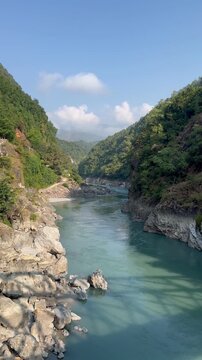Trishuli River flowing and mountains at the background