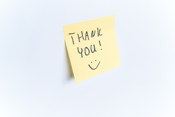 Yellow sticky note with thank you