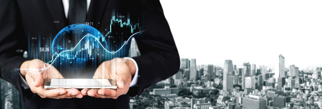 A professional businessman in a suit holds a tablet displaying digital financial graphs and a global sphere against a modern city skyline, symbolizing growth and technology. Scalp - Powered by Adobe