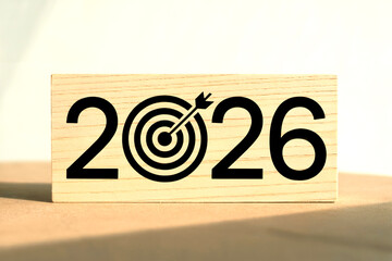 2026 Business Goals and Future Planning Concept with Target and Arrow Symbol on Wooden Block