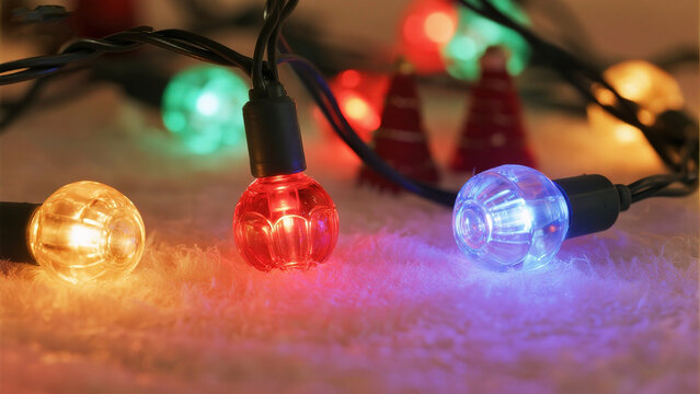 Colorful Christmas lights on a soft surface