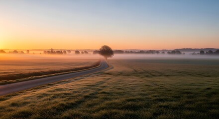 Soft gentle light spreads across silent winter fields