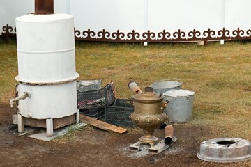 Samovar for preparing drings in Yurt Camp Sary Bulun near Song Kul Lake in the Tian Shan Mountains. Naryn Region. Kyrgyzstan. Asia.