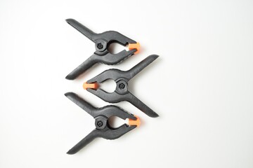 Construction clamps close-up on a white background. Set of tools for repair
