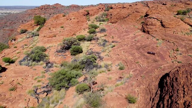 Flying over rock formations in the Kings Canyon in Australia