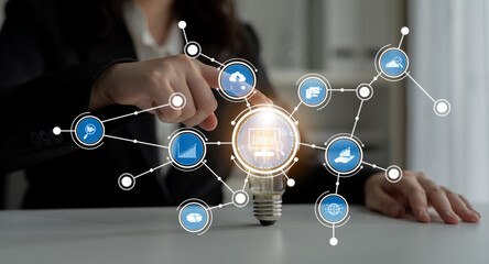 A business person interacts with a digital network representing technology and data analytics, illustrating innovation and connectivity in a modern workspace. Crux