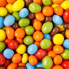 Candies with colorful sugar coating and a chocolate center