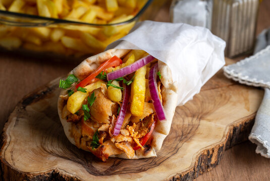 Greek chicken gyros wrapped in pita breads