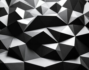 Abstract, geometric pattern composed of folded black and white paper forming a 3D textured surface