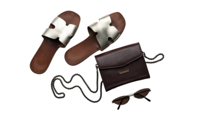 Stylish Summer Accessories Collection with Gold Sandals, Brown Handbag, and Sunglasses on White Background