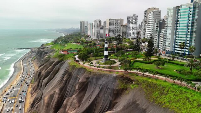 Aerial drone view of the Miraflores district in Lima. The main Lima lighthouse in Peru. Walking along the Miraflores boardwalk on a beautiful sunny day.	