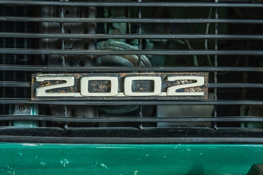 Gothenburg, Sweden - May 24 2025: BMW 2002 rusted emblem on front grille closeup.