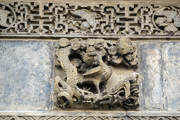 The exquisite brick carvings on the flower Theatre archway in Bozhou City, Anhui Province, China. The Flower Theatre was first built in the Qing Dynasty.