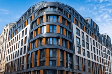 Fototapeta premium Large building with a lot of windows and a brown trim. The building is tall and has a modern look