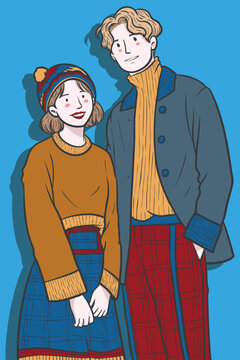 a couple wearing winter outfit with blue background