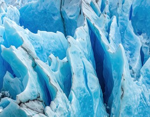 Close-up of intensely blue glacial ice with jagged edges and deep crevices