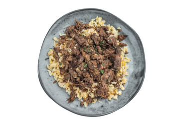 Anatolian kavurma over grains displaying diced and shredded textures, caramelized edges, collagen rendered meat and rustic culinary styling.