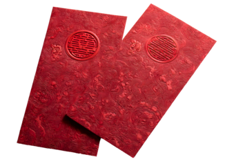 Two ornate red envelopes with golden symbols against a black background