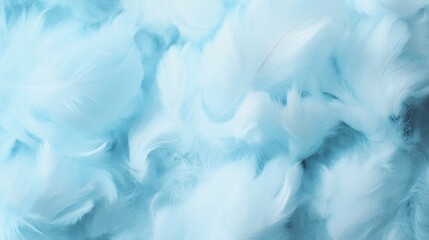 Obraz premium White fluffy feathers placed against a soft light blue background, showing high resolution details that highlight the delicate texture of the feathers for a clean and gentle visual.
