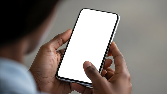 Close-up of a black womans hands holding a mobile phone with a blank white screen 37365739 1