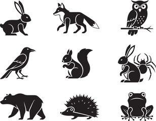 Fototapeta premium Set of nine black silhouette icons of forest and woodland animals Keywords: rabbit, fox, owl, crow, squirrel