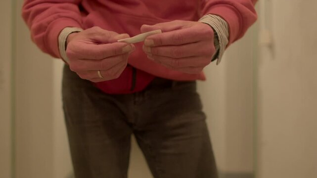 Final checks before handing over, Meticulous adjustment and presentation before completing handoff, Precise handling and careful appearance check to ensure quality before passing along object