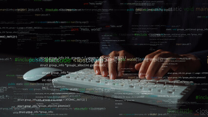 Close-up of hands typing on a white keyboard, surrounded by programming text in a dark atmosphere, capturing the essence of coding and technological innovation. Xenic