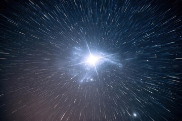Dynamic star trails creating a cosmic light speed explosion.