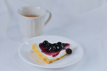 blueberry cheese cake, blueberry cheese tart and hot tea