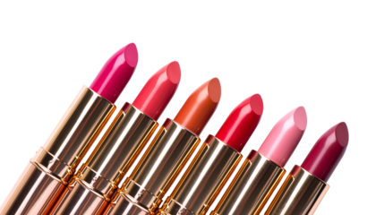 Isolated shiny red lipstick tube for glamour beauty makeup.