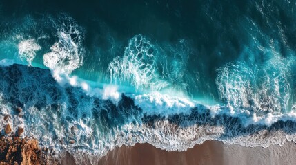Obraz premium The ocean is calm and peaceful, with gentle waves lapping at the shore. The water is a deep blue color, and the sky is clear and bright. The scene is serene and relaxing, and it evokes a sense of calm