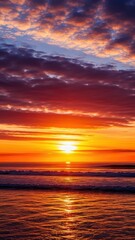 Fototapeta premium Vibrant Ocean Sunset with Fiery Clouds