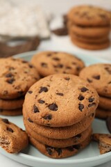 Delicious chocolate chip cookies on table, closeup