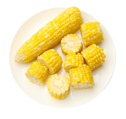 Pieces of boiled corn cobs isolated on white, top view
