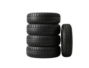 Stack of black car tires isolated on black