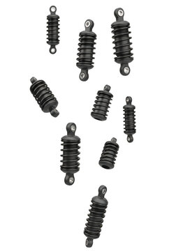 Multiple black rubber shock absorbers dampers vibration isolators mounts bushings for machinery equipment parts isolated on transparent background