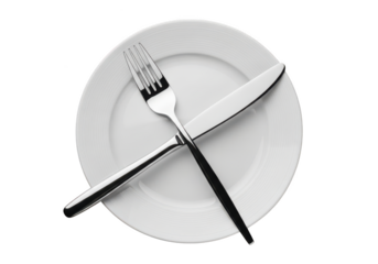 High angle shot of white plate with silver fork and knife utensils dining food isolated on transparent background