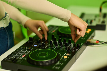 DJ setup overview, Energetic club DJ performing with digital controller in action, Content creator mixing music live using digital turntables under vibrant stage lights