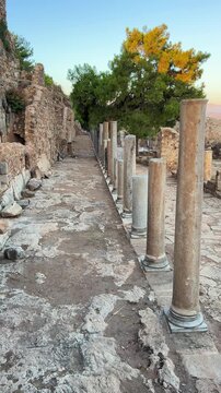 Ruins of the ancient Roman port city of Siedra in Alanya, Antalya, Turkey. The street and ruins of the ancient abandoned ancient city of Siedra on the Mediterranean coast. 4К