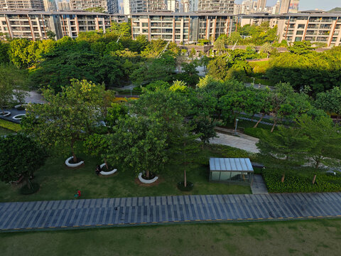 luxury villas and public greenland park with a pedestrian walk, photo taken in Shekou Shenzhen China