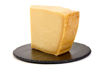 Wedge of Hard Cheese on Slate, isolated on white background
